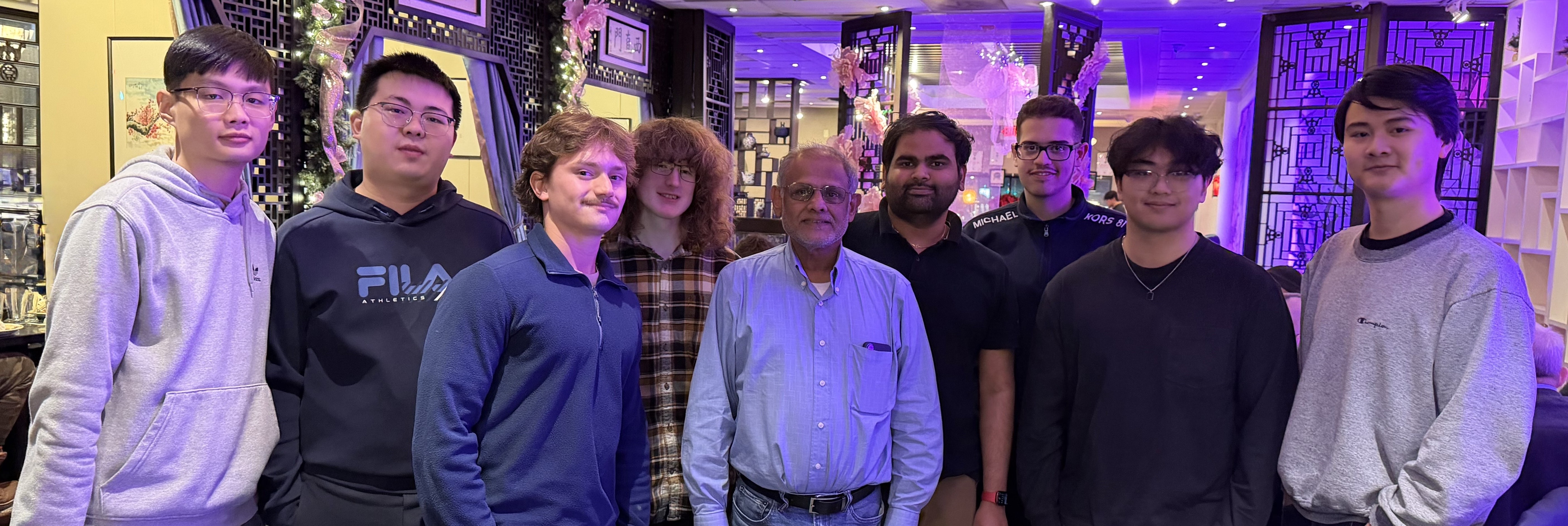 8 Students in a row with Keshab Parhi in the middle