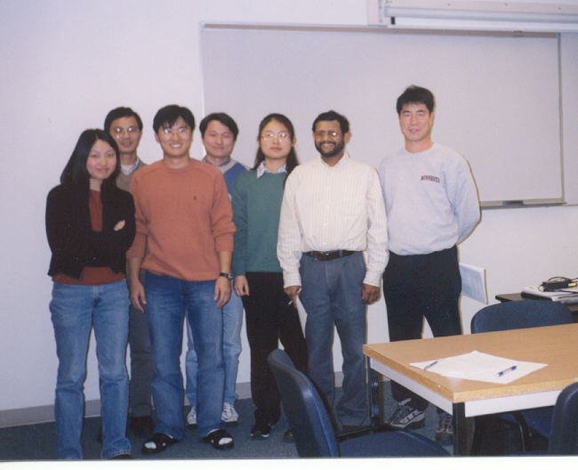 Group of 7 people smiling